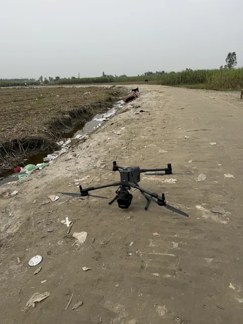 A take-off point on the embankment track beside the fields, on the land side of the survey area
